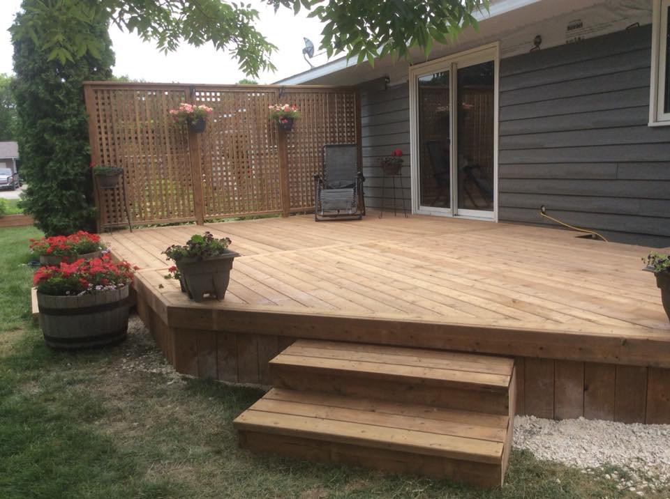 Wooden deck with potted flowers